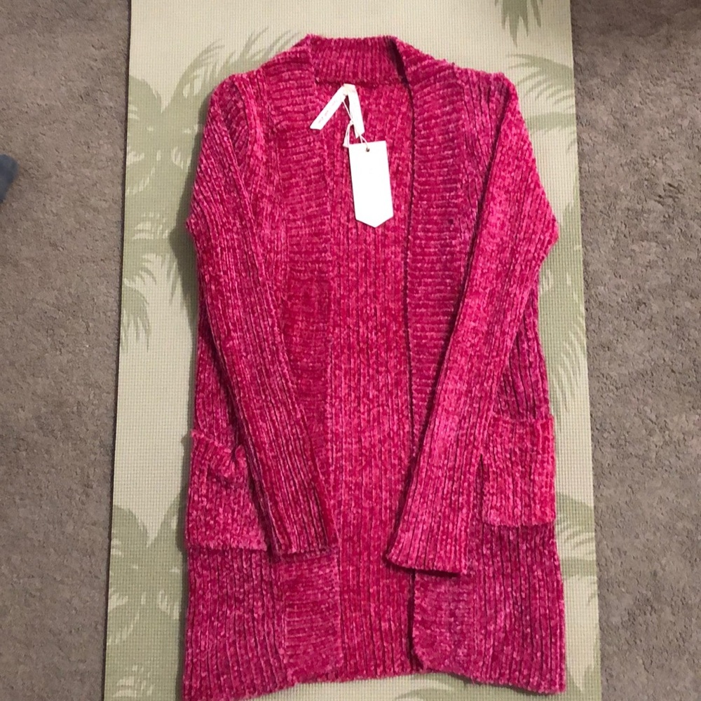 Knitted cozy pink sweater. NWT.